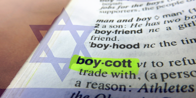 Boycott highlighted in a dictionary with Israeli flag overlaid